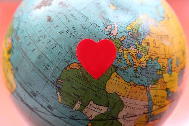 1 globe red heart sticker